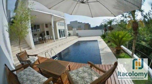 Casa de Condomínio à venda e aluguel com 5 quartos, 428m² - Foto 1