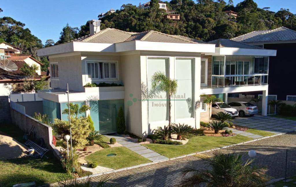 Casa de Condomínio à venda com 4 quartos, 344m² - Foto 1