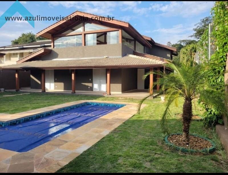 Casa de Condomínio à venda com 4 quartos, 450m² - Foto 1