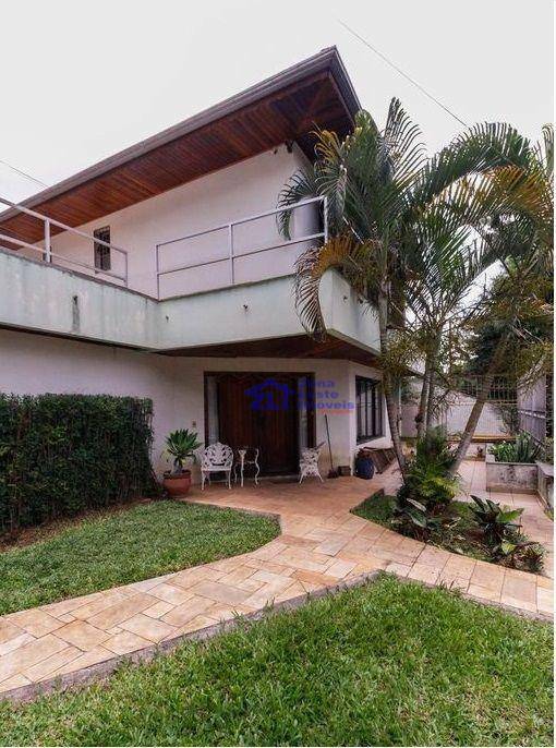 Casa à venda e aluguel com 6 quartos, 450m² - Foto 1