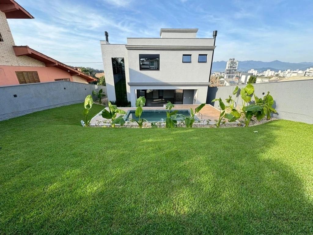 Casa à venda com 4 quartos, 339m² - Foto 7