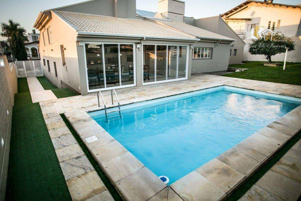 Casa à venda e aluguel com 4 quartos, 425m² - Foto 7