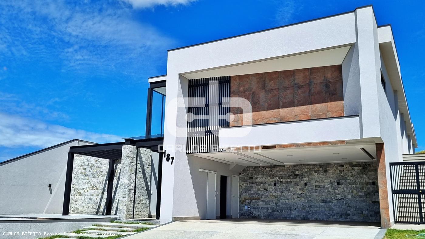 Casa de Condomínio à venda com 3 quartos, 1200m² - Foto 1