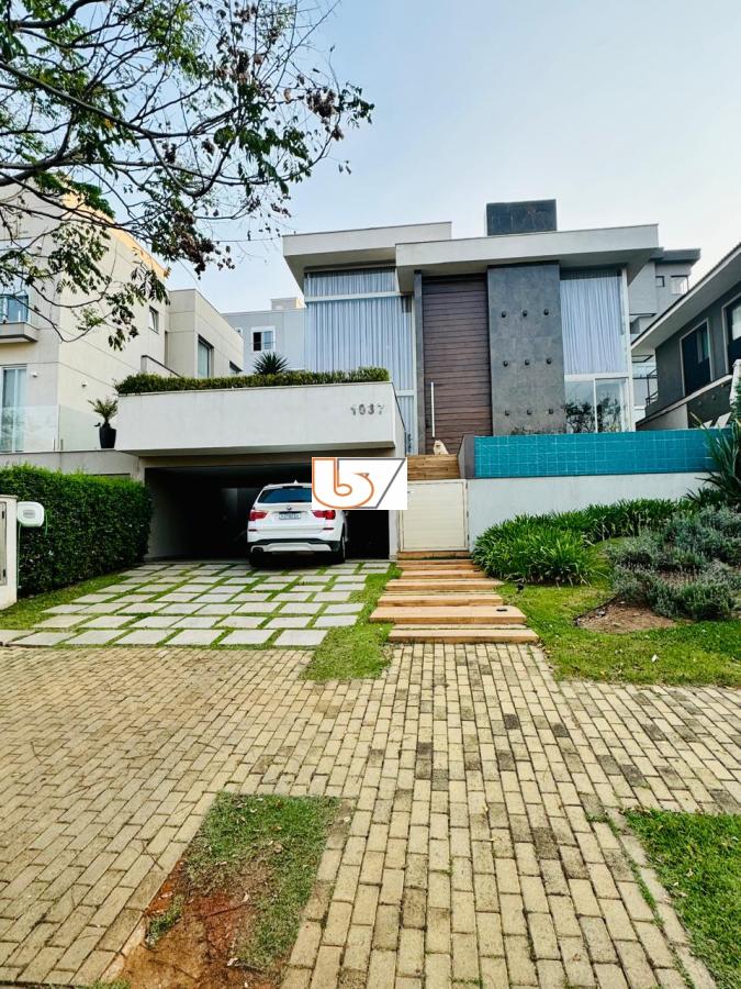 Casa de Condomínio para alugar com 4 quartos, 456m² - Foto 1