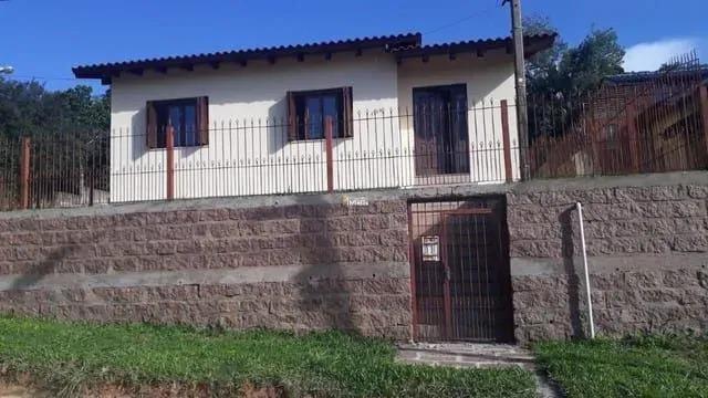 Casa à venda com 3 quartos, 100m² - Foto 1