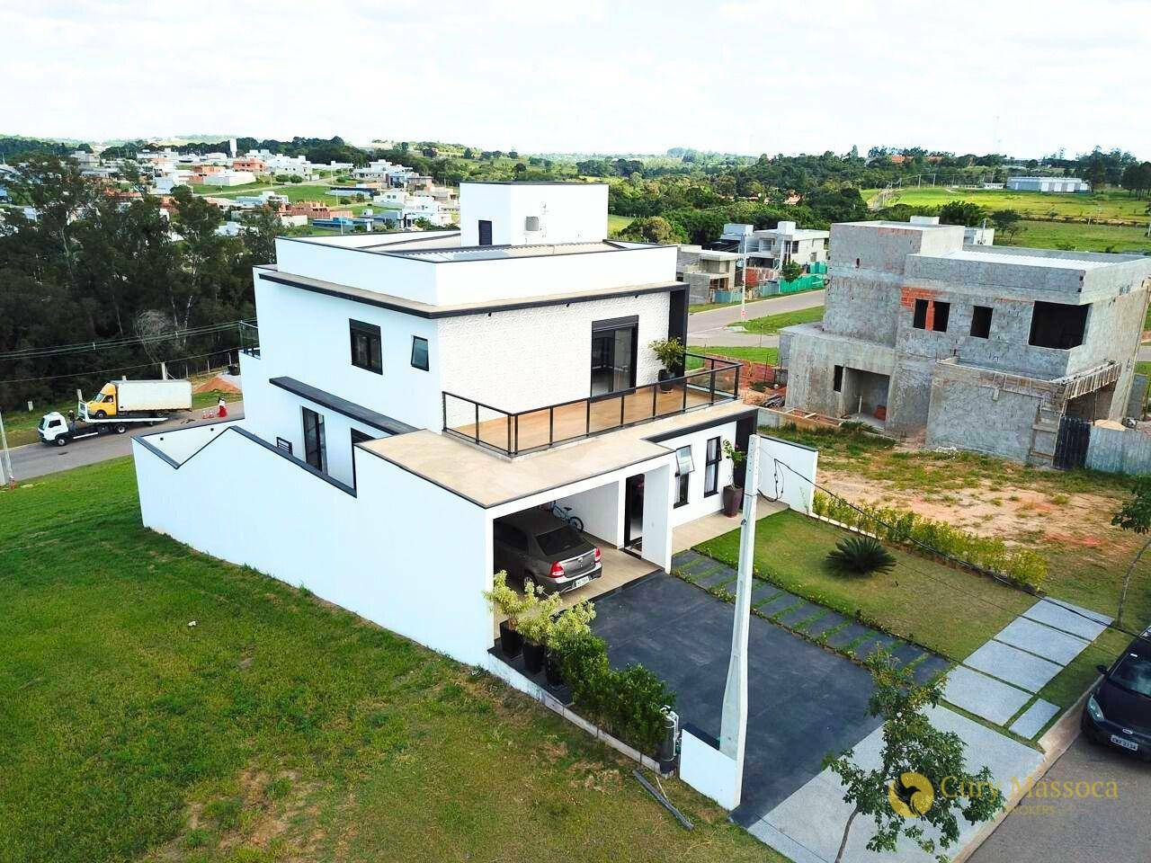 Casa de Condomínio à venda com 4 quartos, 249m² - Foto 1