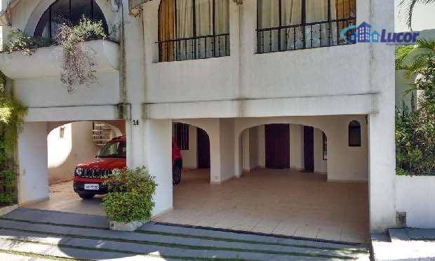 Casa de Condomínio à venda com 4 quartos, 398m² - Foto 2