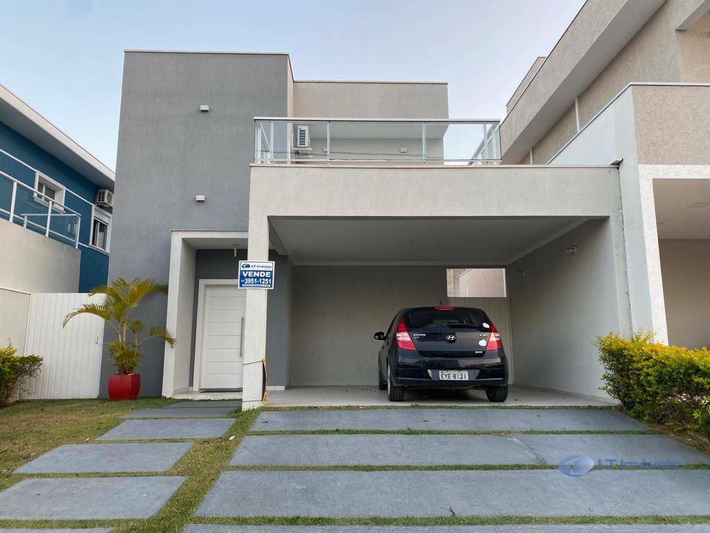 Casa de Condomínio à venda com 4 quartos, 180m² - Foto 1