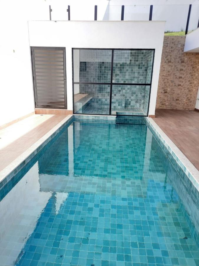 Casa de Condomínio à venda com 4 quartos, 402m² - Foto 16