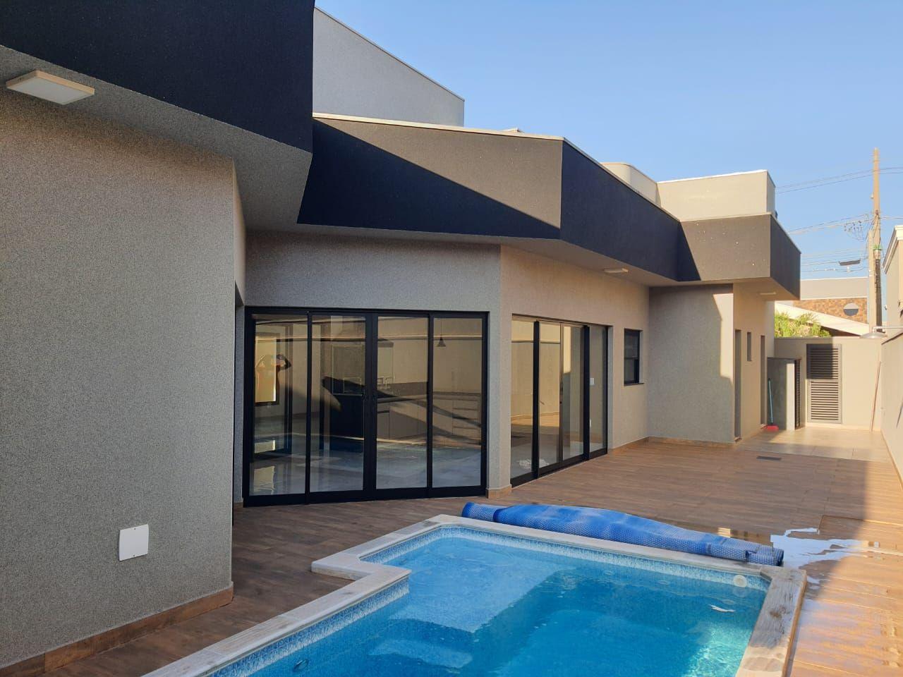Casa à venda com 4 quartos, 265m² - Foto 1