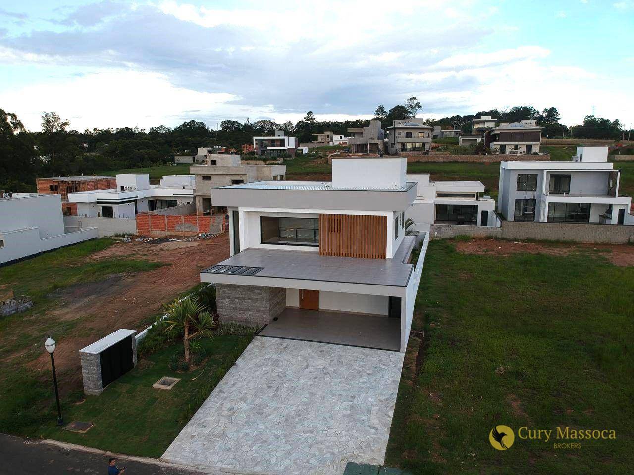 Casa de Condomínio à venda com 4 quartos, 260m² - Foto 1