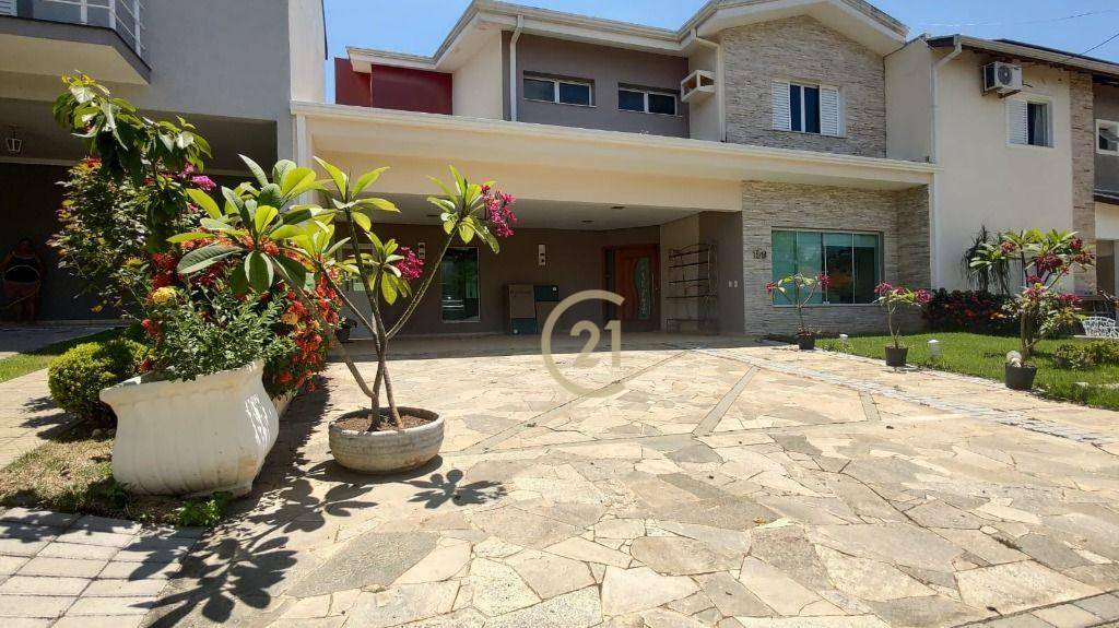 Casa de Condomínio à venda e aluguel com 4 quartos, 305m² - Foto 1