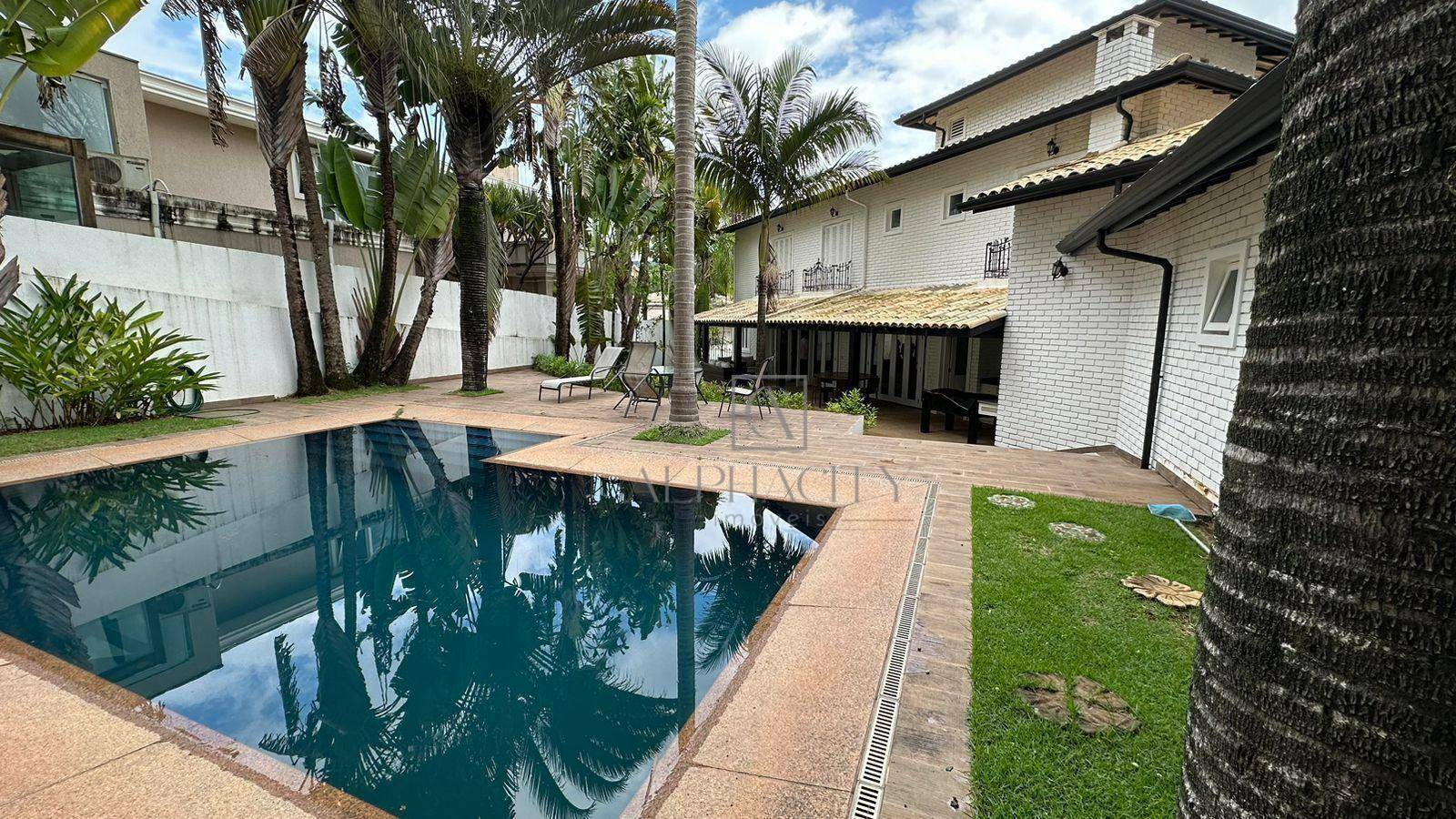 Casa de Condomínio para alugar com 4 quartos, 450m² - Foto 1