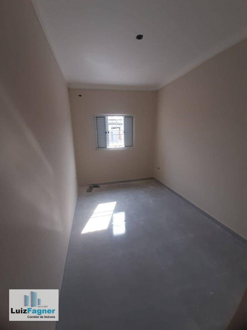 Casa à venda com 3 quartos, 70m² - Foto 11