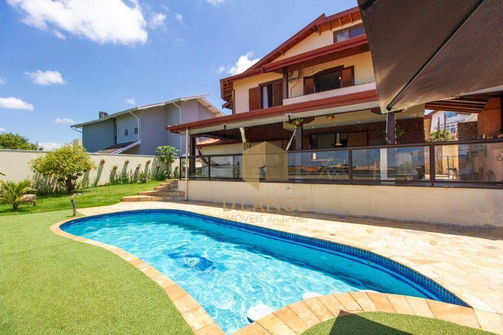 Casa de Condomínio à venda com 4 quartos, 375m² - Foto 1