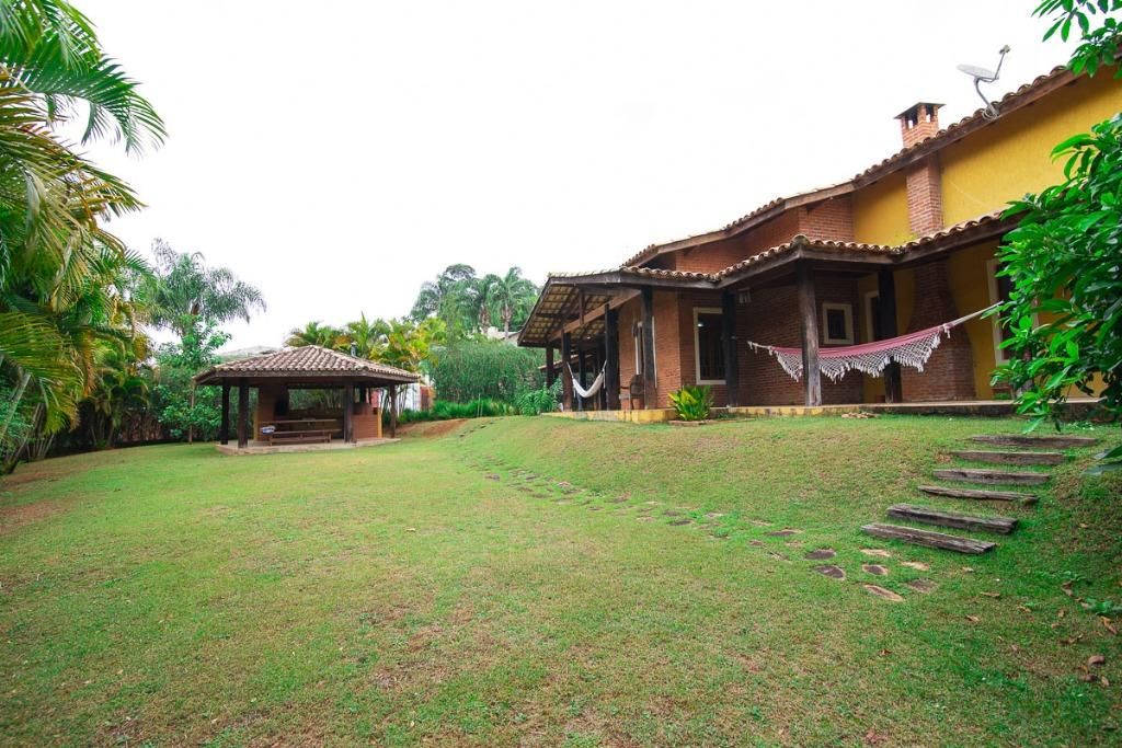 Casa de Condomínio à venda e aluguel com 4 quartos, 660m² - Foto 1