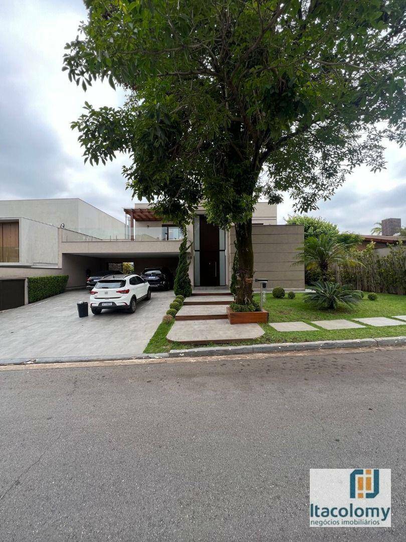 Casa de Condomínio à venda e aluguel com 4 quartos, 676m² - Foto 1