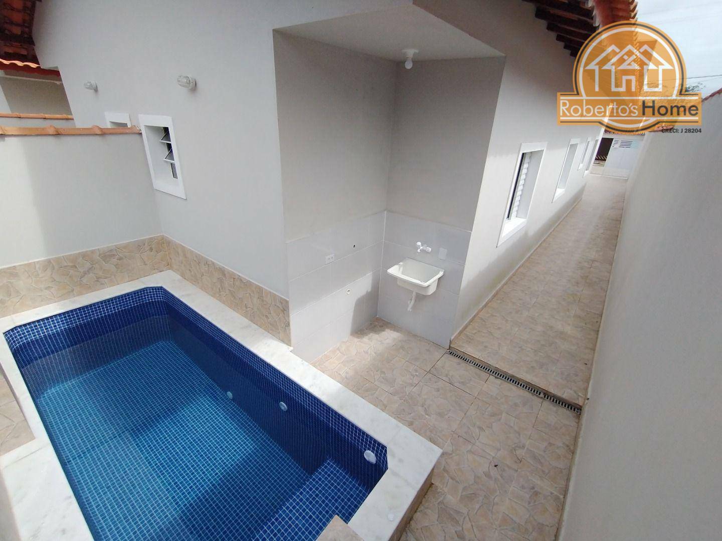 Casa à venda com 2 quartos, 64m² - Foto 1