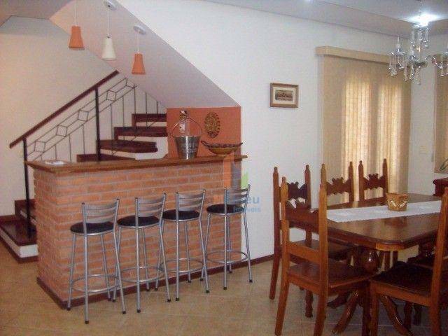 Casa de Condomínio à venda com 4 quartos, 330m² - Foto 2