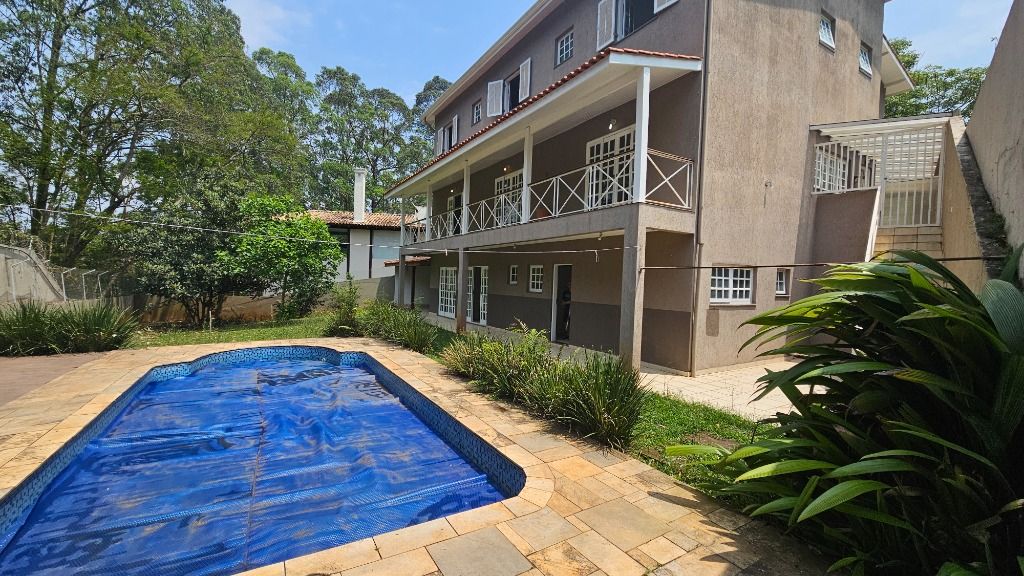 Casa de Condomínio para alugar com 6 quartos, 450m² - Foto 82