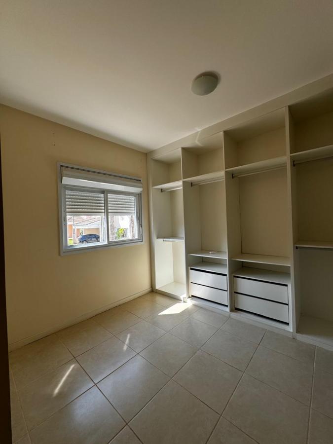 Casa de Condomínio para alugar com 4 quartos, 130m² - Foto 13