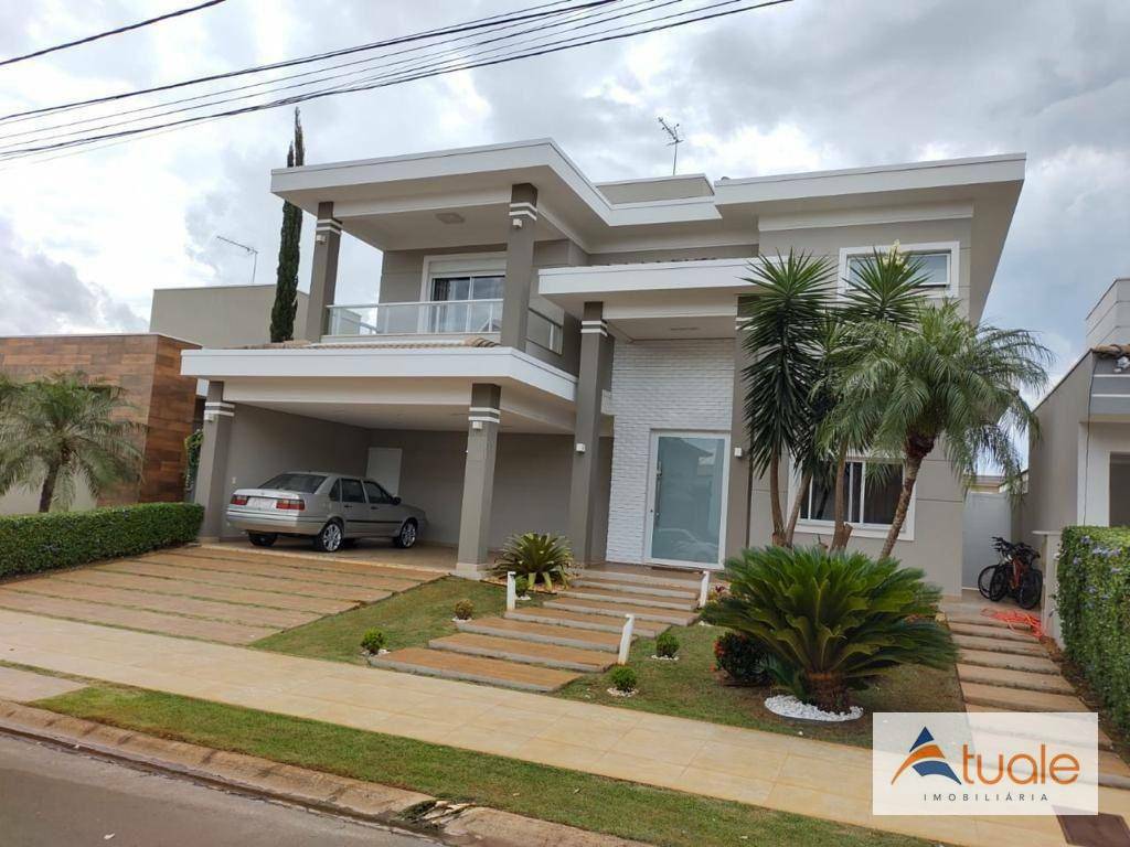 Casa de Condomínio à venda com 4 quartos, 426m² - Foto 1