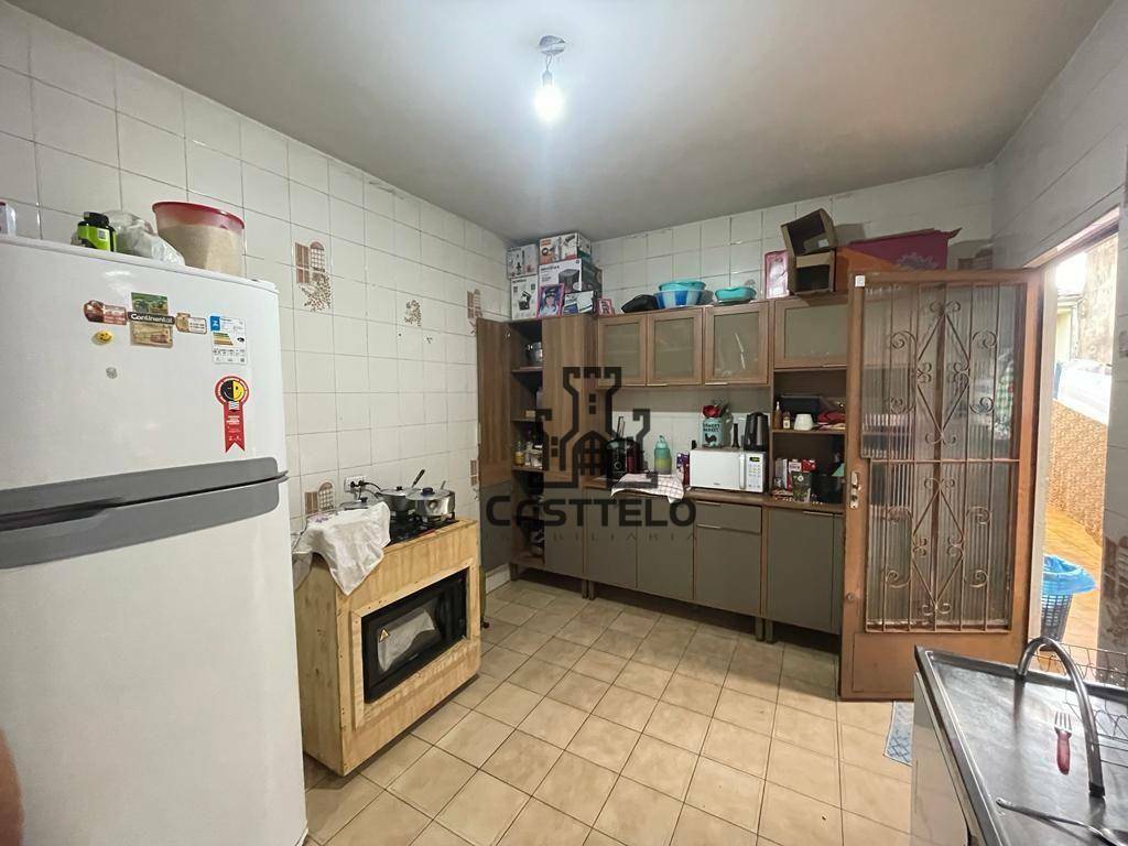 Casa à venda com 4 quartos, 170m² - Foto 12