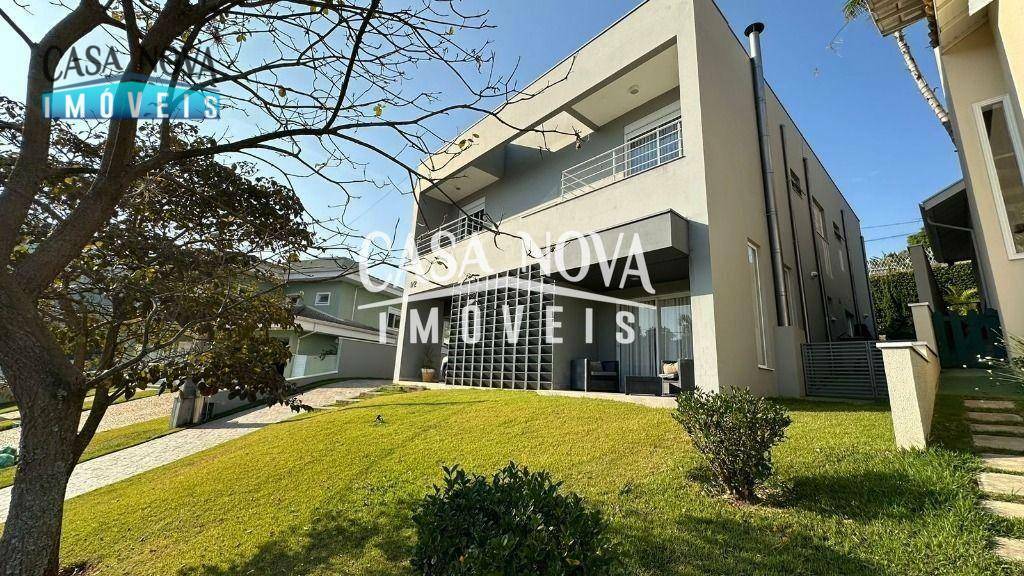 Casa de Condomínio à venda com 4 quartos, 389m² - Foto 1