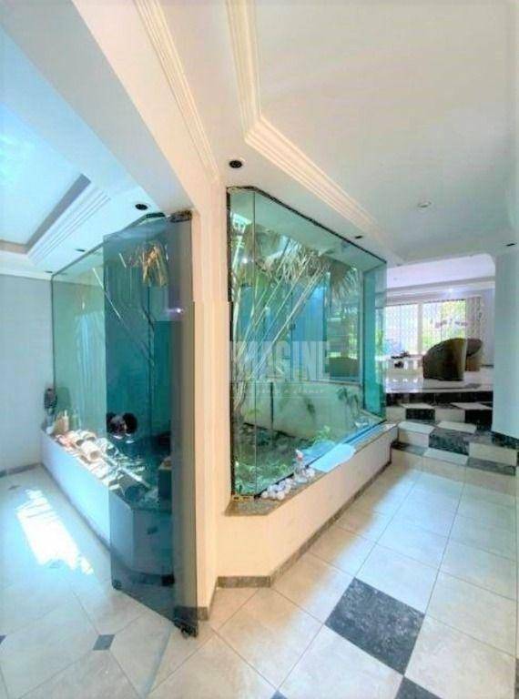 Sobrado para alugar com 4 quartos, 600m² - Foto 11