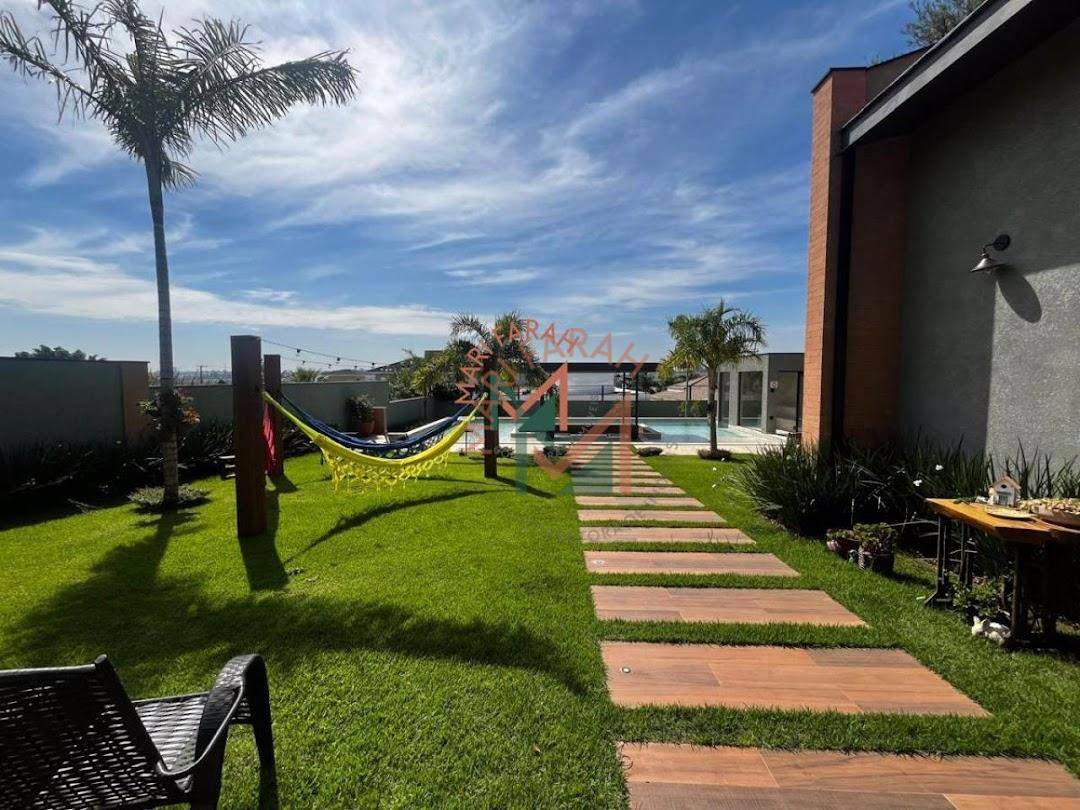 Casa de Condomínio à venda com 4 quartos, 457m² - Foto 4