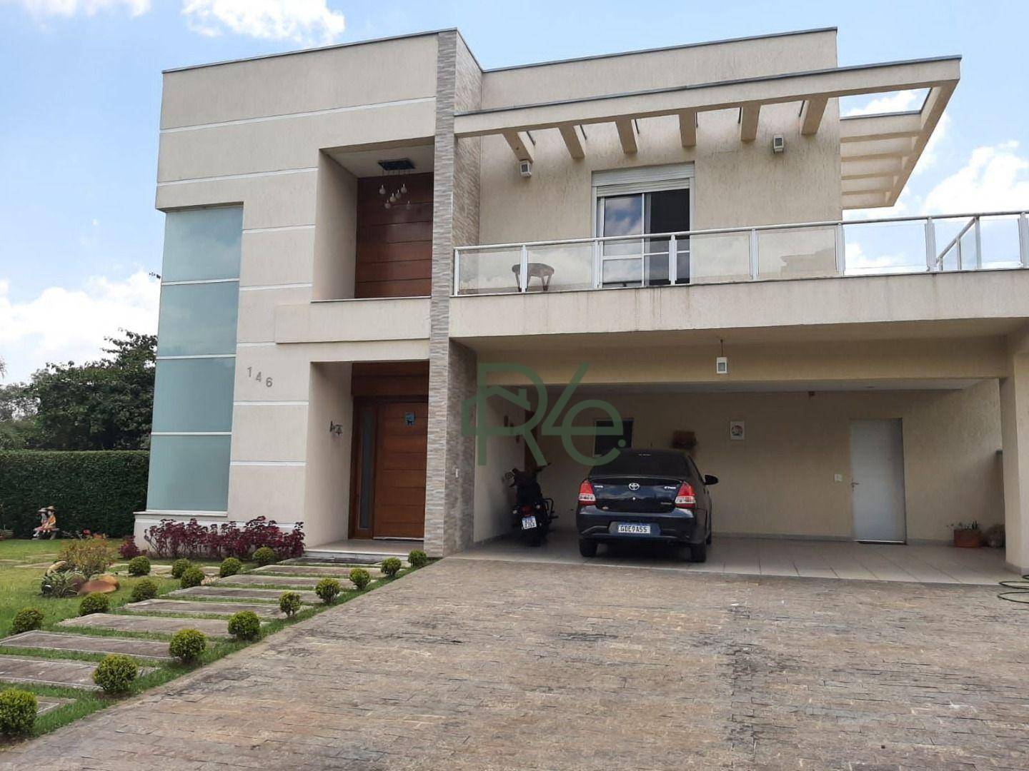 Casa de Condomínio à venda com 4 quartos, 376m² - Foto 1