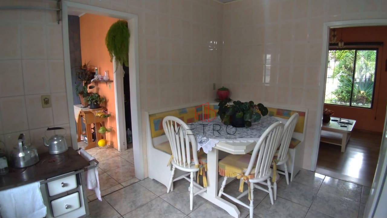 Casa à venda com 4 quartos, 169m² - Foto 2