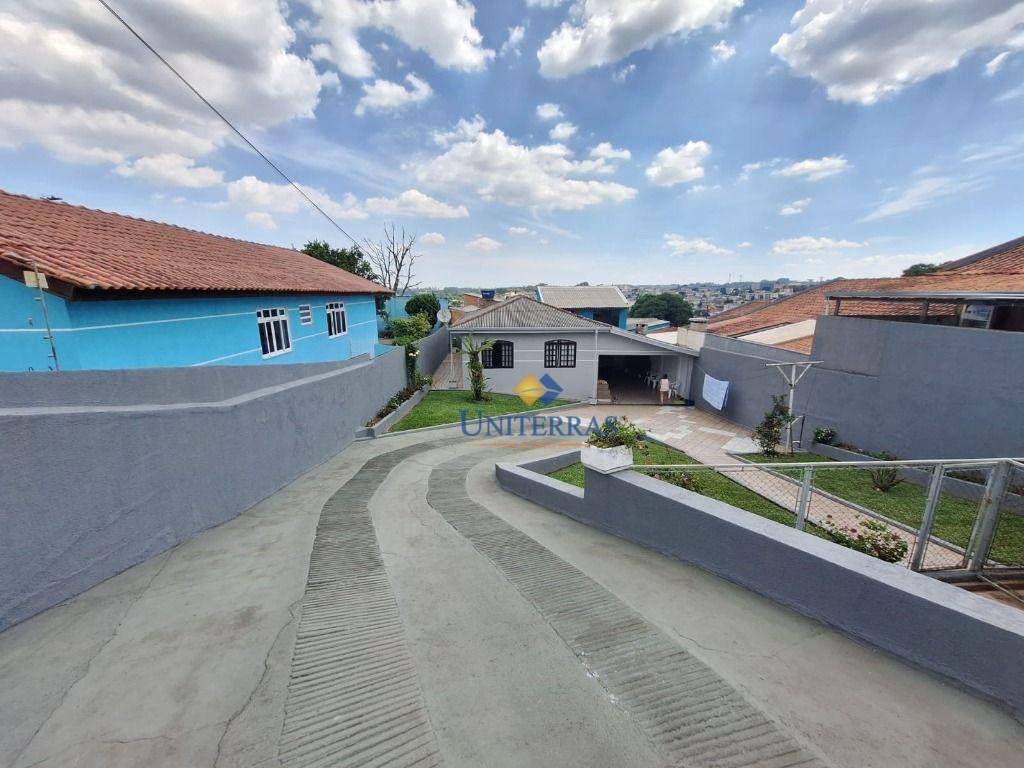 Casa à venda com 3 quartos, 100m² - Foto 1