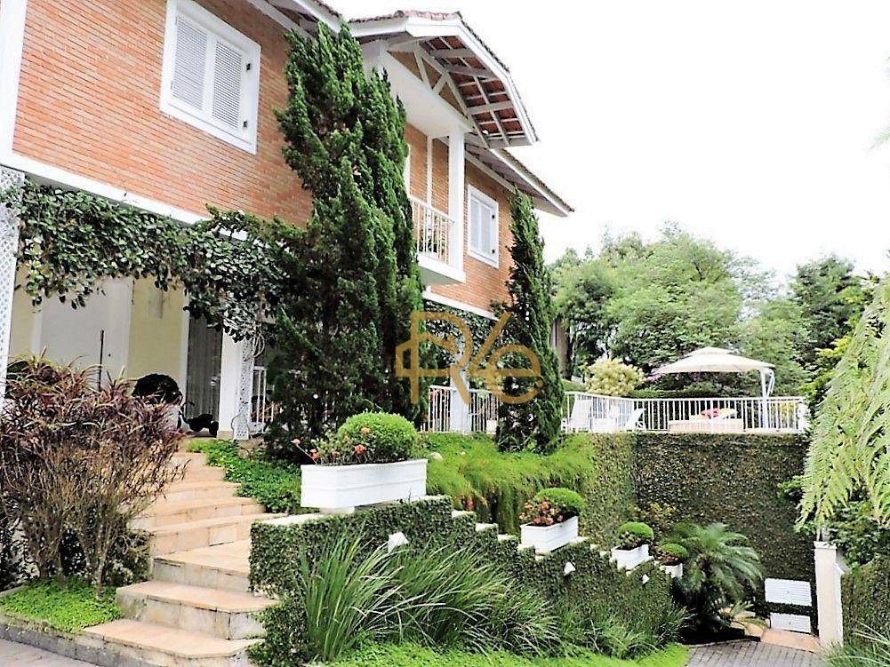 Casa de Condomínio à venda com 4 quartos, 429m² - Foto 1