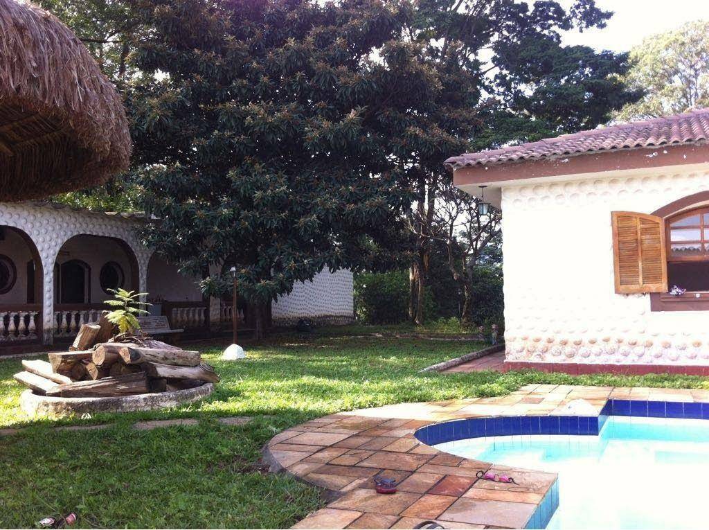 Casa à venda e aluguel com 5 quartos, 450m² - Foto 1