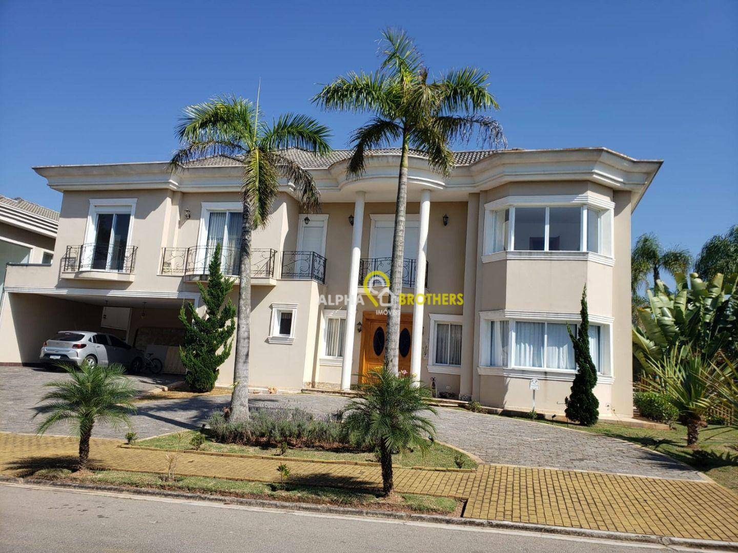 Casa de Condomínio à venda e aluguel com 5 quartos, 618m² - Foto 1