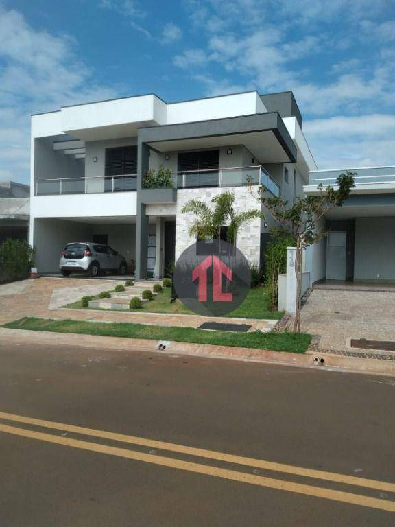 Casa de Condomínio à venda com 4 quartos, 242m² - Foto 1