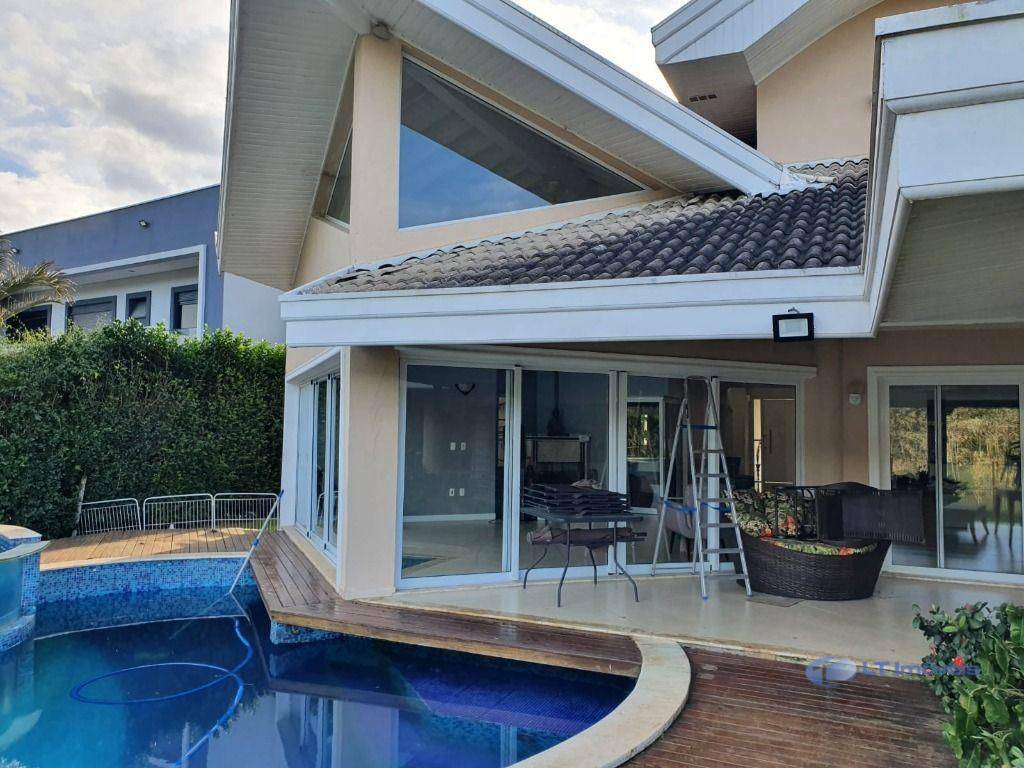 Casa de Condomínio à venda com 4 quartos, 384m² - Foto 1
