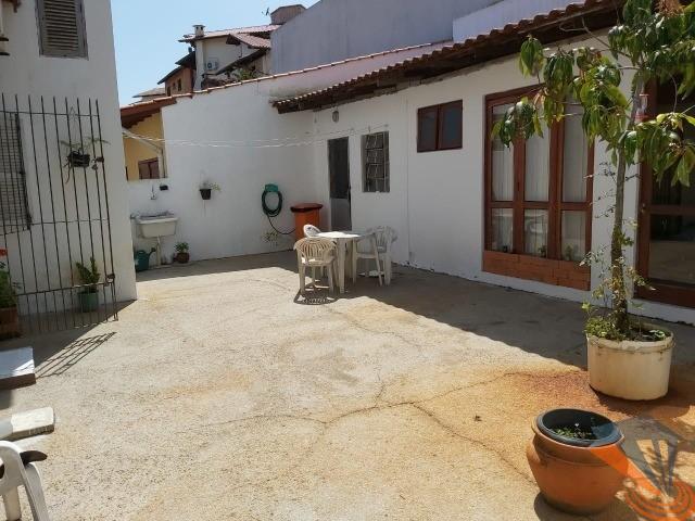 Casa à venda com 3 quartos, 100m² - Foto 1