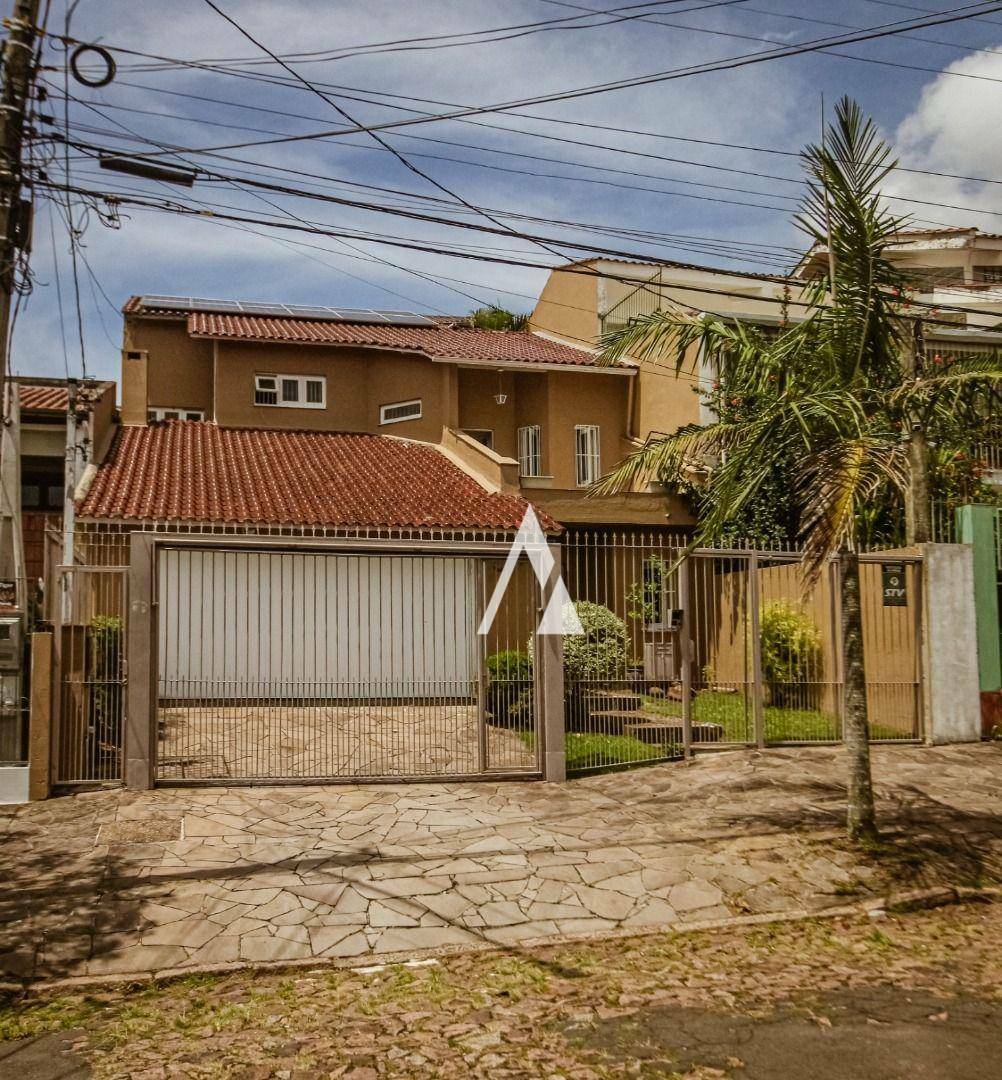 Casa à venda com 3 quartos, 306m² - Foto 1