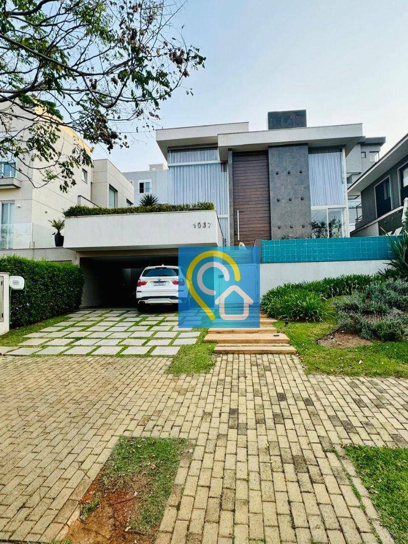 Casa de Condomínio para alugar com 4 quartos, 301m² - Foto 1