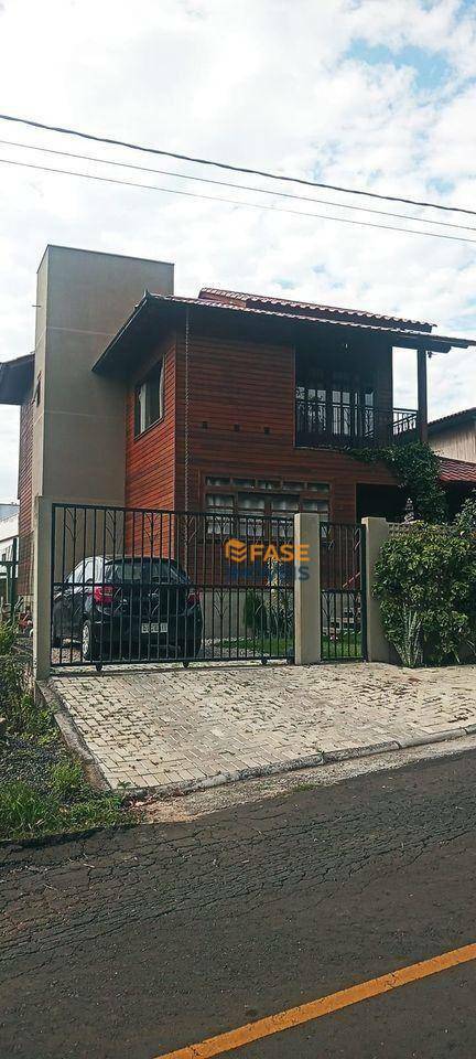 Casa à venda com 3 quartos, 100m² - Foto 1