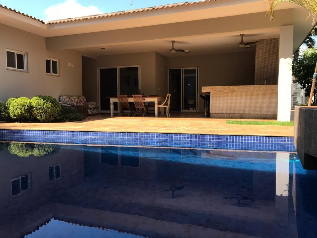 Casa de Condomínio à venda com 5 quartos, 412m² - Foto 1