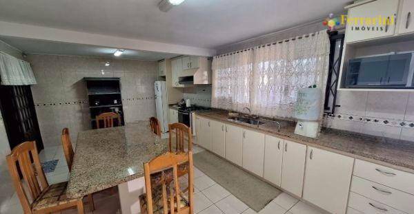 Casa à venda com 3 quartos, 339m² - Foto 6