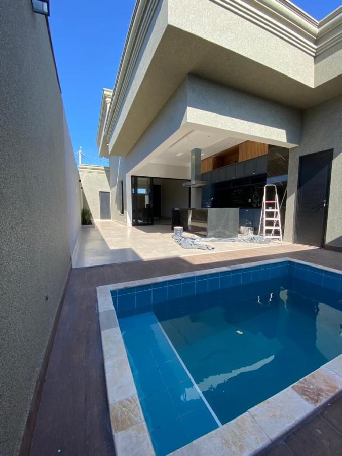 Casa à venda com 3 quartos, 165m² - Foto 1