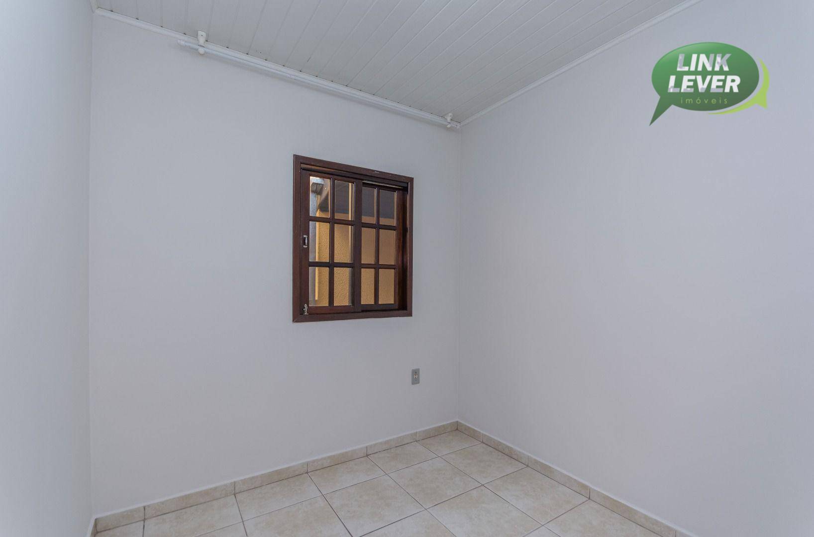 Casa para alugar com 3 quartos, 64m² - Foto 11
