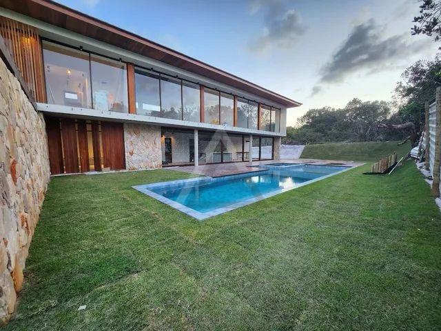 Casa de Condomínio à venda com 7 quartos, 450m² - Foto 1