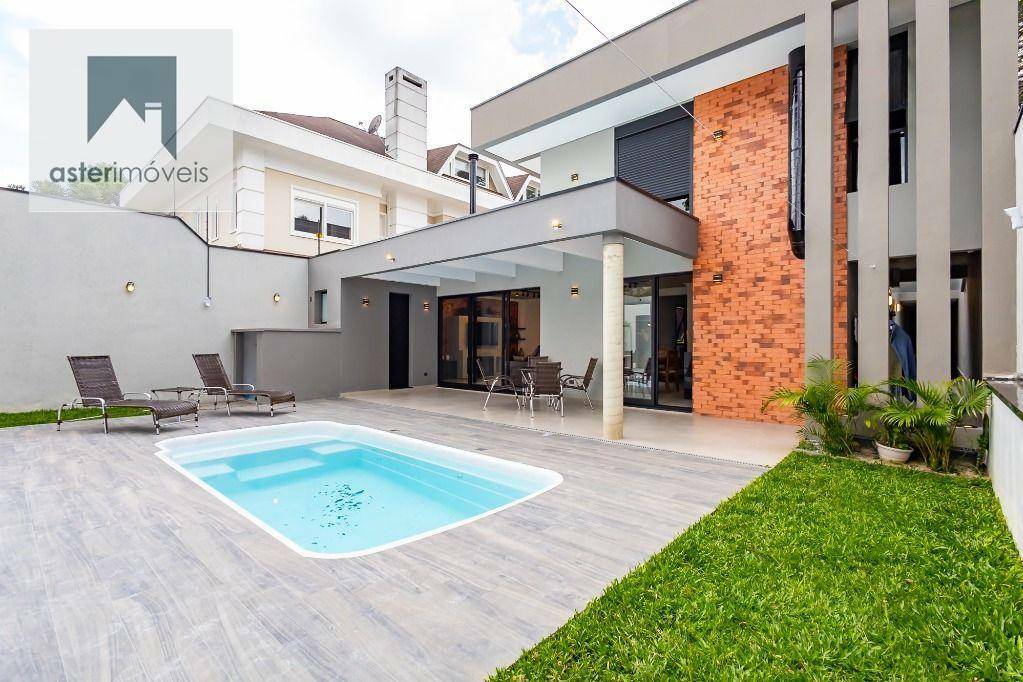 Casa à venda com 4 quartos, 323m² - Foto 1