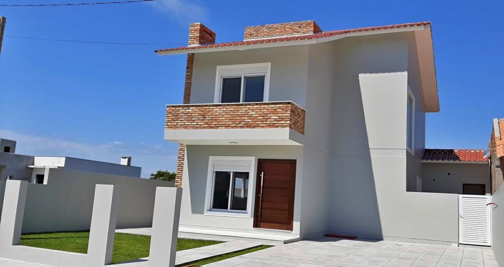 Casa à venda com 3 quartos, 136m² - Foto 1