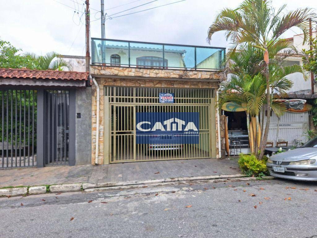 Casa à venda com 3 quartos, 218m² - Foto 1